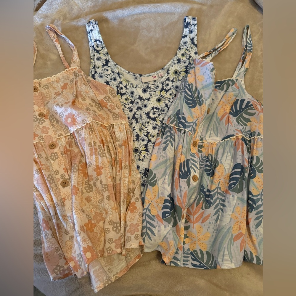 3 Floral sleeveless blouses